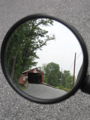 Looking back at a covered bridge