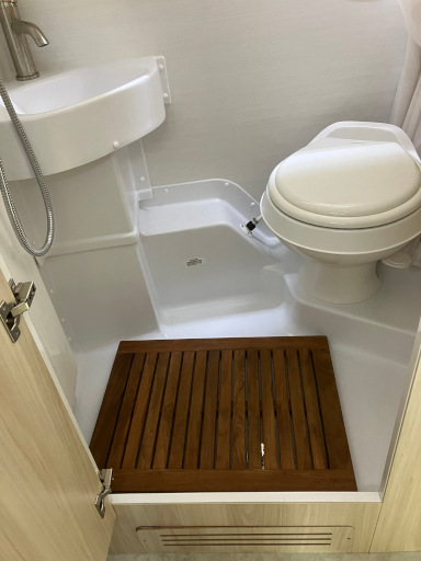 Teak shower mat
    in bathroom